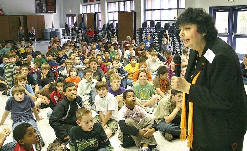 Scientist, author and Holocaust survivor Inge Auerbacher describes her experiences as a child in Nazi concentration camp to sixth-grade students Tuesday at Montgomery Middle School. Staff photo by Brad Meyer.