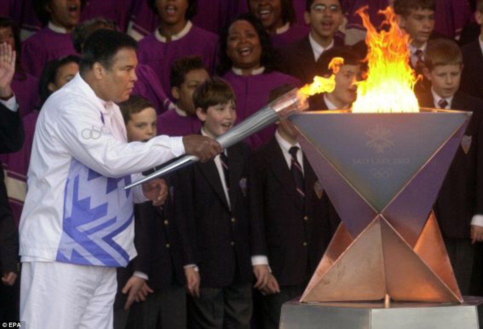 Ali, who won the gold medal in Rome in 1960, lights the Olympic flame ahead of the Games in Atlanta, Georgia in 1996 